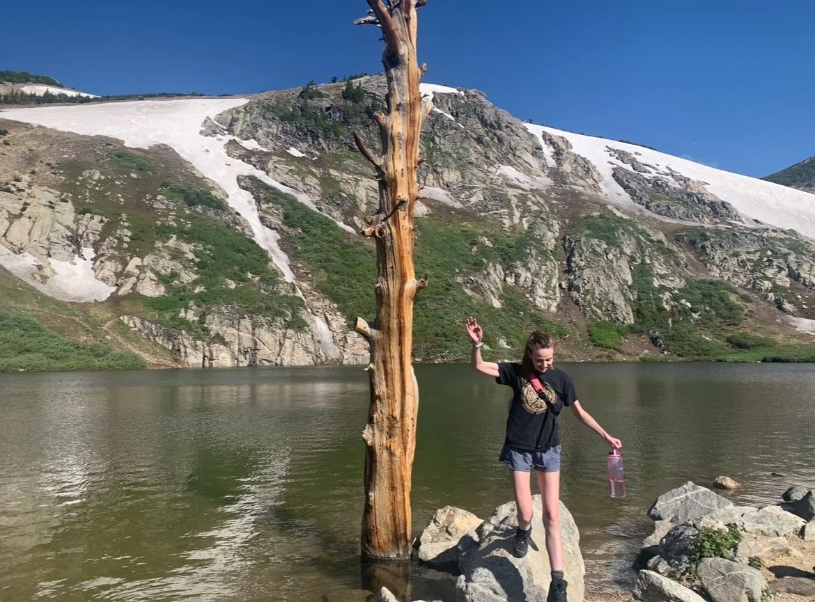 Alpine lake with snowy ridge
